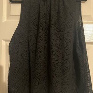 Black fully lined sleeveless sheer polka dot blouse